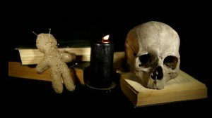 stock-footage-human-skull-and-voodoo-doll